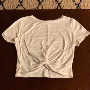 White shirt with a knot in the front